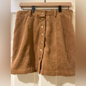 Medium HYFVE camel colored skirt.